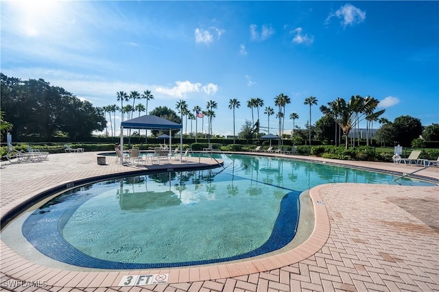 community pool with a patio