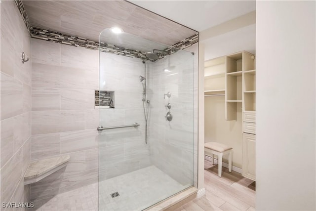 17080 Harbour Point Dr Unit 12B, Fort Myers, FL 33908 - full bathroom with a tile shower and a walk in closet