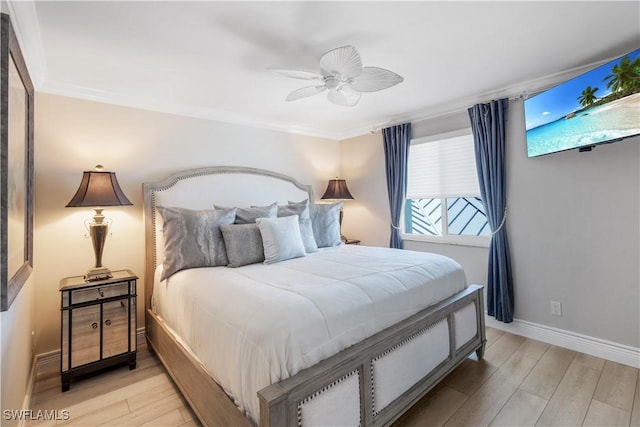17080 Harbour Point Dr Unit 12B, Fort Myers, FL 33908 - bedroom with light wood-type flooring, baseboards, ceiling fan, and ornamental molding