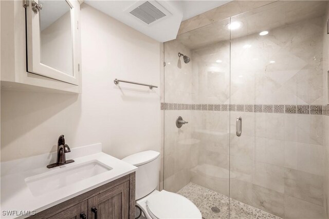 17080 Harbour Point Dr Unit 12B, Fort Myers, FL 33908 - full bath featuring a shower stall, toilet, and vanity