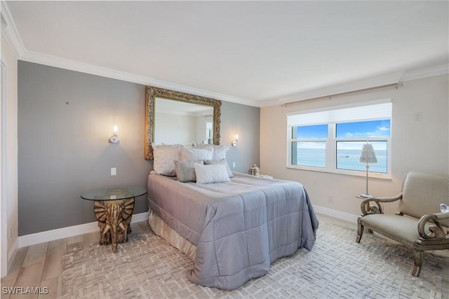 17080 Harbour Point Dr Unit 12B, Fort Myers, FL 33908 - bedroom featuring crown molding, baseboards, and light wood-style floors