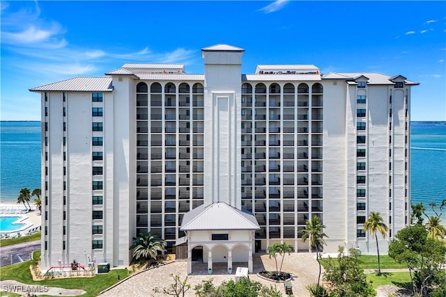 17080 Harbour Point Dr Unit 12B, Fort Myers, FL 33908 - view of building exterior featuring a water view