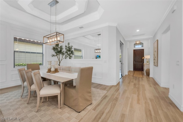 28009 Foxrock Ct, Bonita Springs, FL 34135 - dining area featuring ornamental molding, light wood finished floors, an inviting chandelier, and recessed lighting