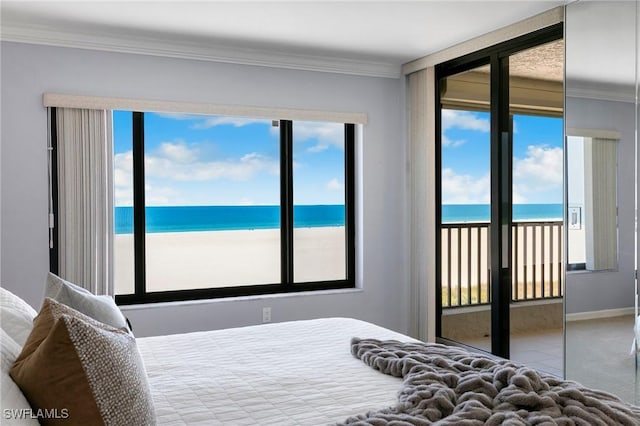 100 N Collier Blvd Unit 507, Marco Island, FL 34145 - bedroom featuring access to outside, crown molding, a water view, and baseboards