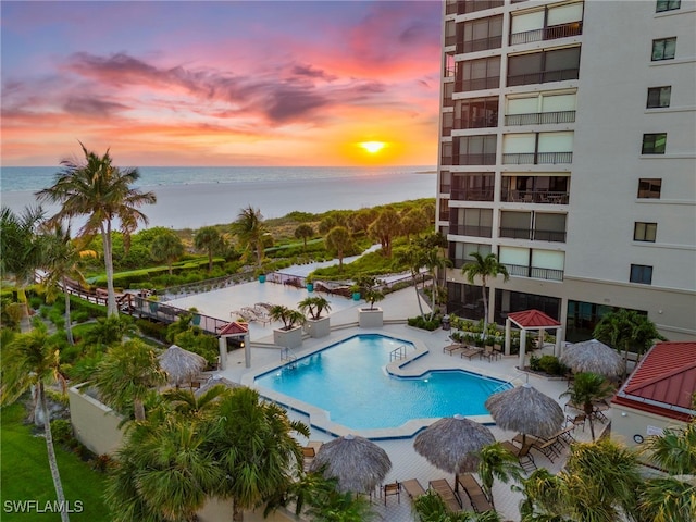 100 N Collier Blvd Unit 507, Marco Island, FL 34145 - community pool with a water view and a patio area