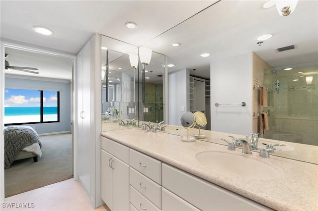 100 N Collier Blvd Unit 507, Marco Island, FL 34145 - bathroom with double vanity, a stall shower, tile patterned flooring, recessed lighting, and ensuite bath