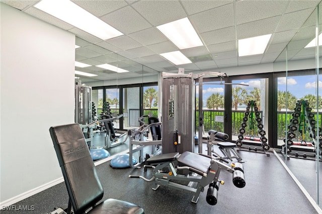 100 N Collier Blvd Unit 507, Marco Island, FL 34145 - exercise room with a drop ceiling and baseboards