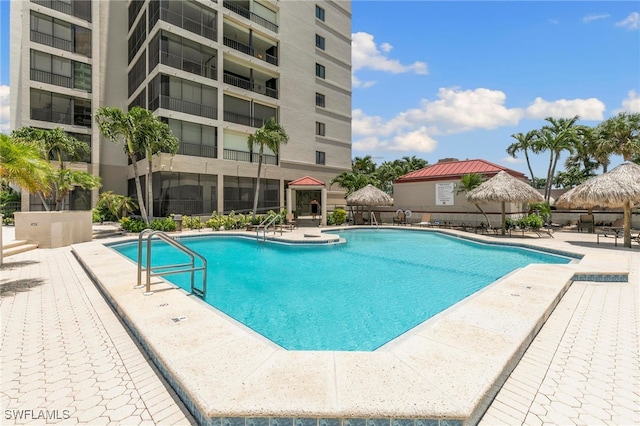 100 N Collier Blvd Unit 507, Marco Island, FL 34145 - community pool with a patio