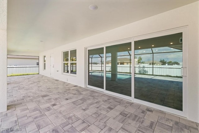 view of patio / terrace featuring fence