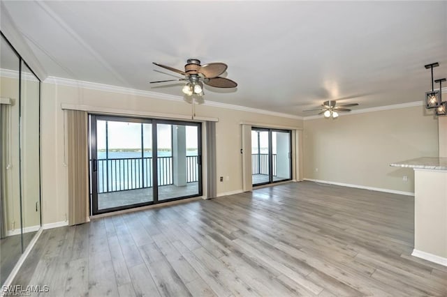 1910 Virginia Ave Unit 1302, Fort Myers, FL 33901 - unfurnished living room featuring ceiling fan, light wood-type flooring, baseboards, and crown molding