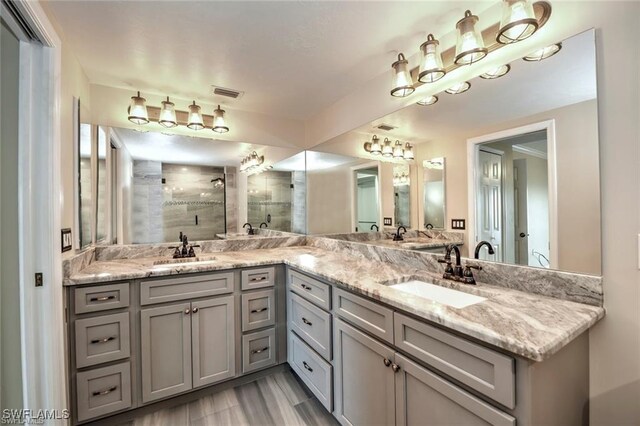 1910 Virginia Ave Unit 1302, Fort Myers, FL 33901 - bathroom with a shower stall and double vanity