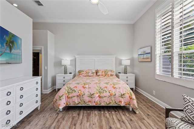 8540 Pepper Tree Way, Naples, FL 34114 - bedroom with wood finished floors, ornamental molding, baseboards, and ceiling fan
