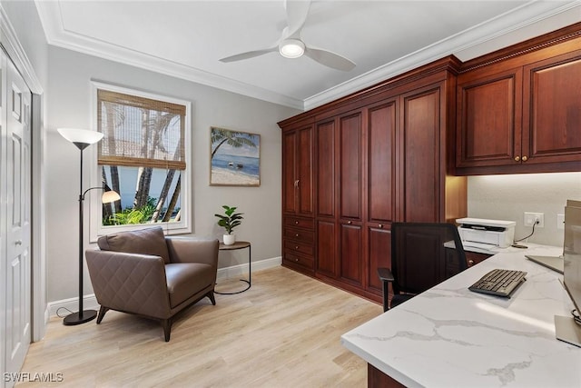 office area with light wood finished floors, ceiling fan, ornamental molding, and baseboards