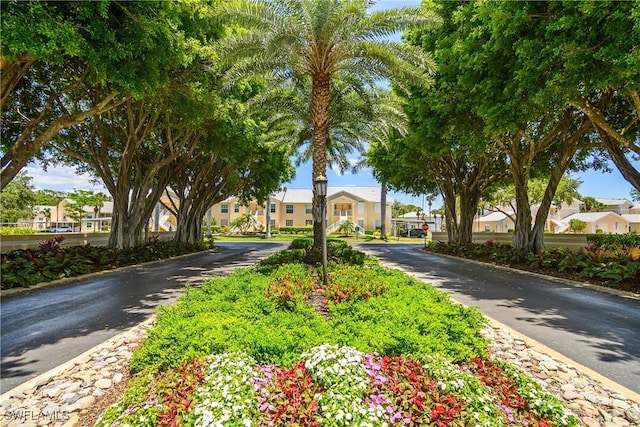 773 Wiggins Lake Dr Unit 102, Naples, FL 34110 - view of road featuring a residential view