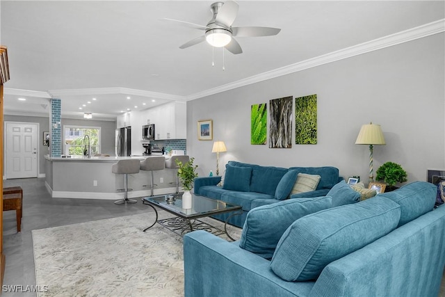 773 Wiggins Lake Dr Unit 102, Naples, FL 34110 - living area featuring crown molding, baseboards, recessed lighting, ceiling fan, and concrete flooring