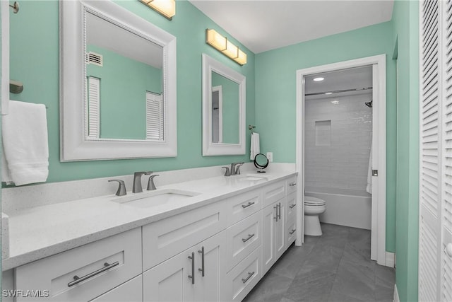 773 Wiggins Lake Dr Unit 102, Naples, FL 34110 - bathroom with double vanity, toilet, and bathing tub / shower combination