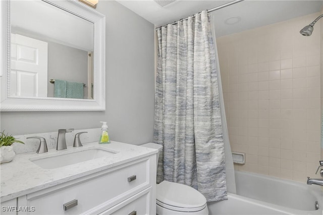 773 Wiggins Lake Dr Unit 102, Naples, FL 34110 - bathroom featuring toilet, vanity, and shower / tub combo
