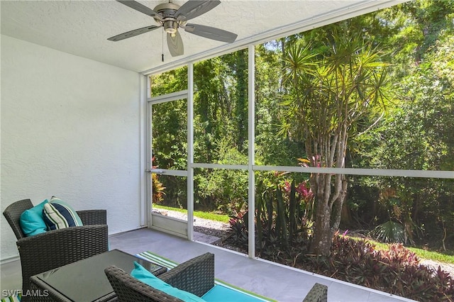 773 Wiggins Lake Dr Unit 102, Naples, FL 34110 - sunroom with ceiling fan