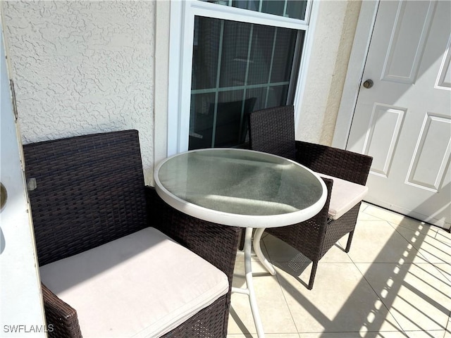 balcony featuring a patio and outdoor dining space