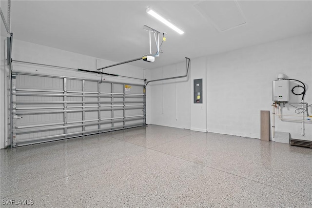 19402 Hinkley Dr, Estero, FL 33928 - garage featuring electric panel, a garage door opener, and tankless water heater