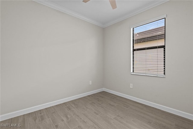 19402 Hinkley Dr, Estero, FL 33928 - spare room featuring ornamental molding, baseboards, wood finished floors, and ceiling fan