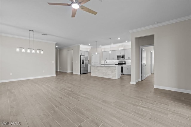 19402 Hinkley Dr, Estero, FL 33928 - unfurnished living room with a ceiling fan, baseboards, recessed lighting, ornamental molding, and light wood-style floors