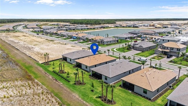 19402 Hinkley Dr, Estero, FL 33928 - aerial view of residential area with a nearby body of water