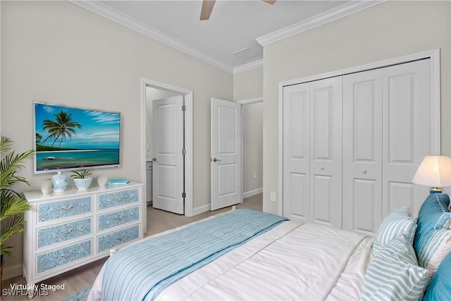 19402 Hinkley Dr, Estero, FL 33928 - bedroom with crown molding, a closet, baseboards, and ceiling fan