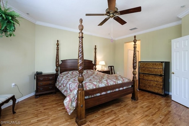 4873 Hampshire Ct Unit 5-101, Naples, FL 34112 - bedroom with crown molding, baseboards, light wood-type flooring, and visible vents