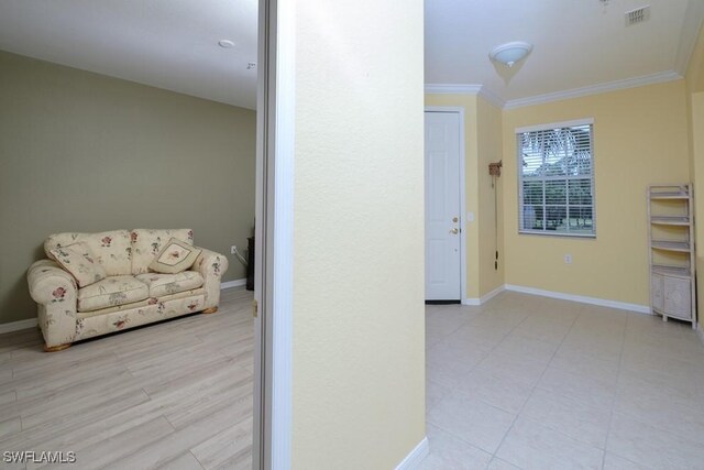 4873 Hampshire Ct Unit 5-101, Naples, FL 34112 - hall featuring crown molding, visible vents, and baseboards