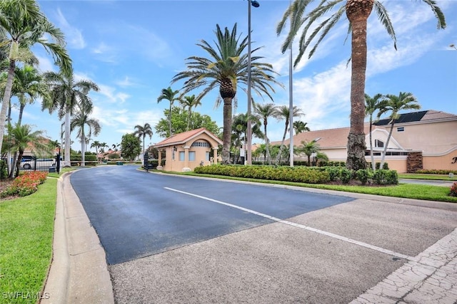 1273 Naples Lake Dr, Naples, FL 34104 - view of road with street lights and curbs