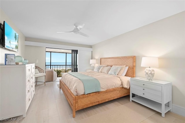 bedroom with a ceiling fan, light wood finished floors, and access to outside