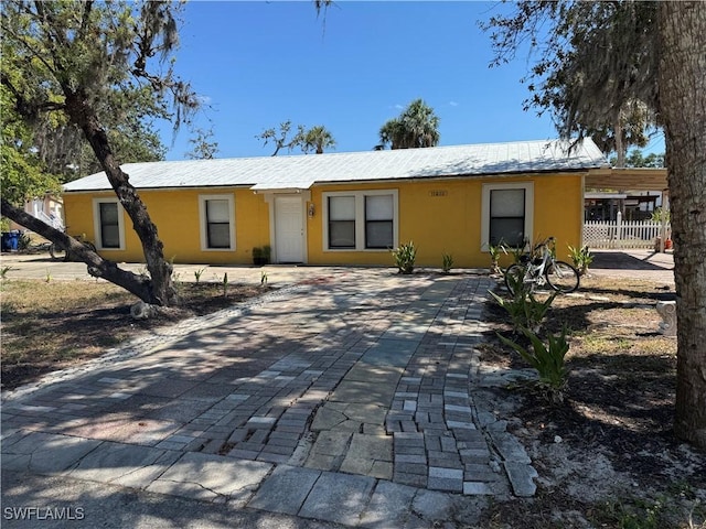 11688 Saunders Ave, Bonita Springs, FL 34135 - ranch-style home with stucco siding and decorative driveway