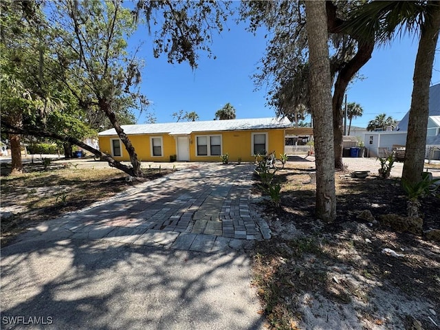 11688 Saunders Ave, Bonita Springs, FL 34135 - view of front of home featuring decorative driveway