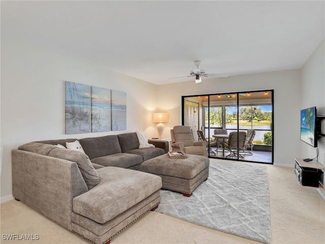 13111 Cross Creek Blvd Unit 208, Fort Myers, FL 33912 - carpeted living room with ceiling fan and baseboards