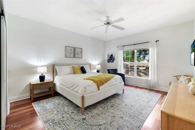 26271 Devonshire Ct Unit 202, Bonita Springs, FL 34134 - bedroom featuring wood finished floors, baseboards, and ceiling fan