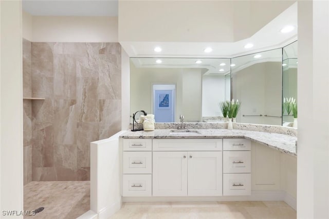 26271 Devonshire Ct Unit 202, Bonita Springs, FL 34134 - bathroom featuring recessed lighting, a walk in shower, and vanity