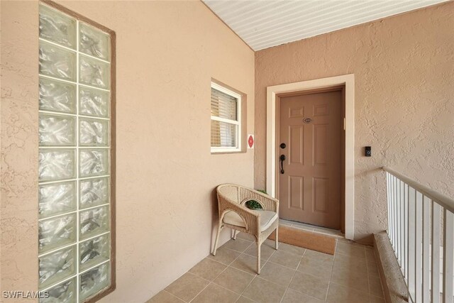 26271 Devonshire Ct Unit 202, Bonita Springs, FL 34134 - entrance to property featuring stucco siding