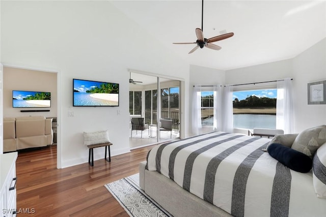 26271 Devonshire Ct Unit 202, Bonita Springs, FL 34134 - bedroom featuring wood finished floors, access to outside, lofted ceiling, baseboards, and a ceiling fan