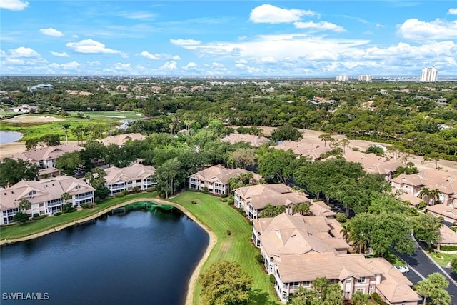 26271 Devonshire Ct Unit 202, Bonita Springs, FL 34134 - aerial perspective of suburban area with a nearby body of water and a tree filled landscape