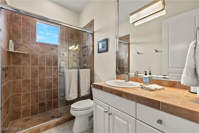 15411 Catalpa Cove Ln, Fort Myers, FL 33908 - bathroom with tile patterned floors, vanity, toilet, and a shower stall