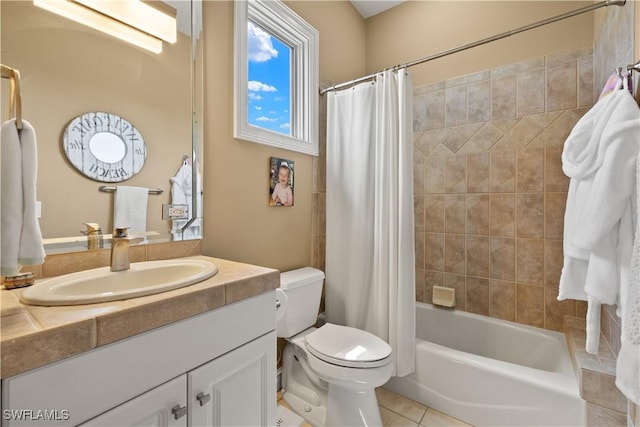 15411 Catalpa Cove Ln, Fort Myers, FL 33908 - full bath with vanity, toilet, tile patterned flooring, and shower / bath combo