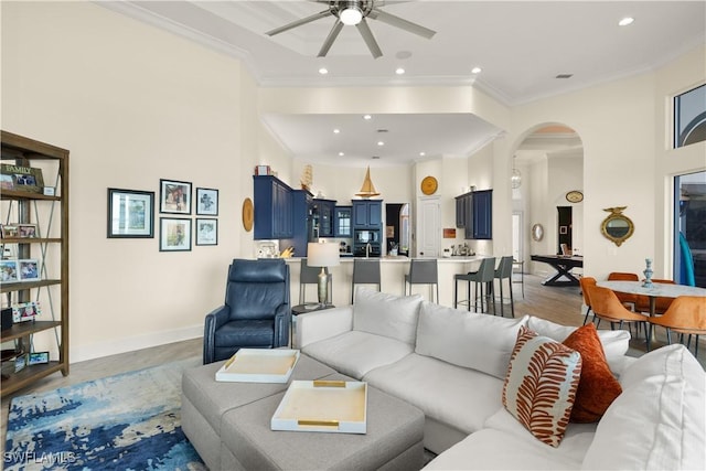 15411 Catalpa Cove Ln, Fort Myers, FL 33908 - living room featuring recessed lighting, baseboards, ceiling fan, and arched walkways