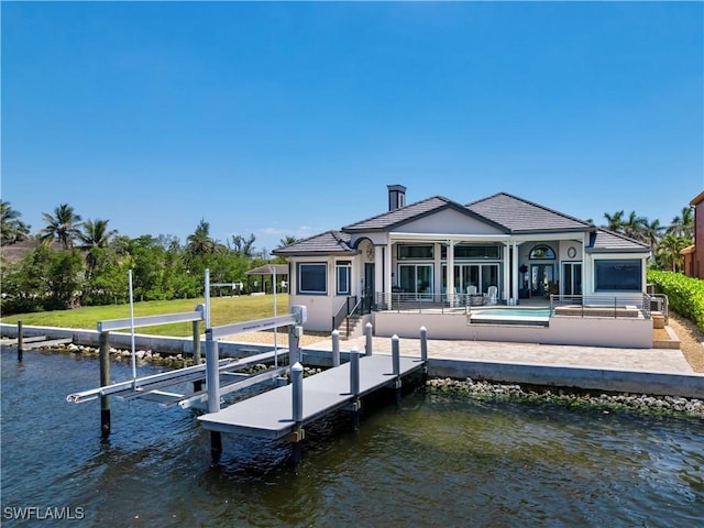 15411 Catalpa Cove Ln, Fort Myers, FL 33908 - dock area featuring boat lift, a patio area, and a water view