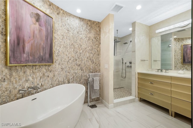 14220 Royal Harbour Ct Unit 607, Fort Myers, FL 33908 - full bath featuring a soaking tub, a tile shower, vanity, marble finish flooring, and recessed lighting