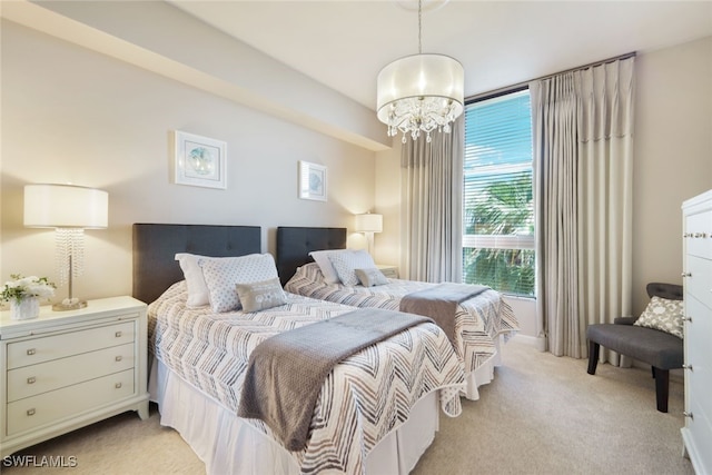 14220 Royal Harbour Ct Unit 607, Fort Myers, FL 33908 - bedroom featuring a chandelier and light carpet