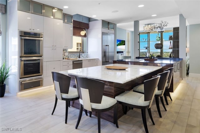 14220 Royal Harbour Ct Unit 607, Fort Myers, FL 33908 - dining area featuring light wood-style flooring and recessed lighting