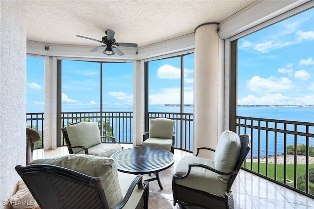 14220 Royal Harbour Ct Unit 607, Fort Myers, FL 33908 - sunroom with a water view and a textured ceiling