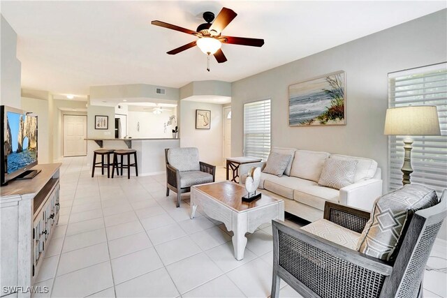 10910 Santa Margherita Rd Unit 101, Estero, FL 34135 - living area featuring a ceiling fan and light tile patterned flooring