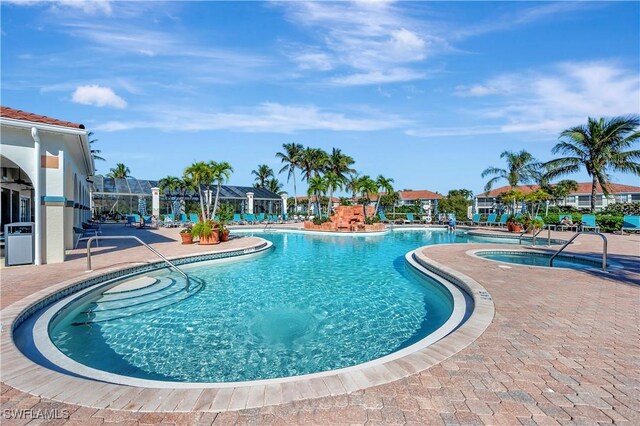 10910 Santa Margherita Rd Unit 101, Estero, FL 34135 - community pool with a patio area